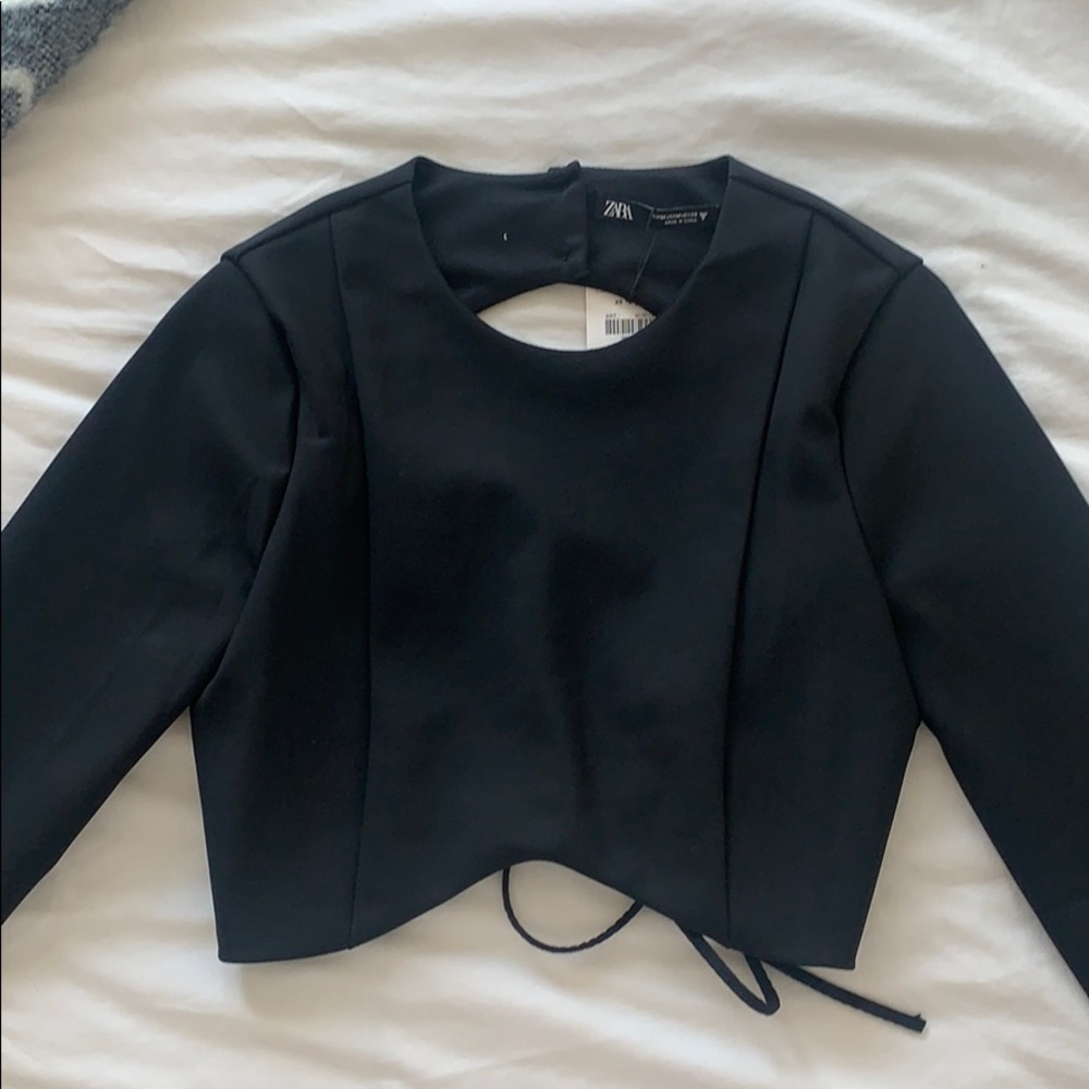 Black long sleeve crop top with open back